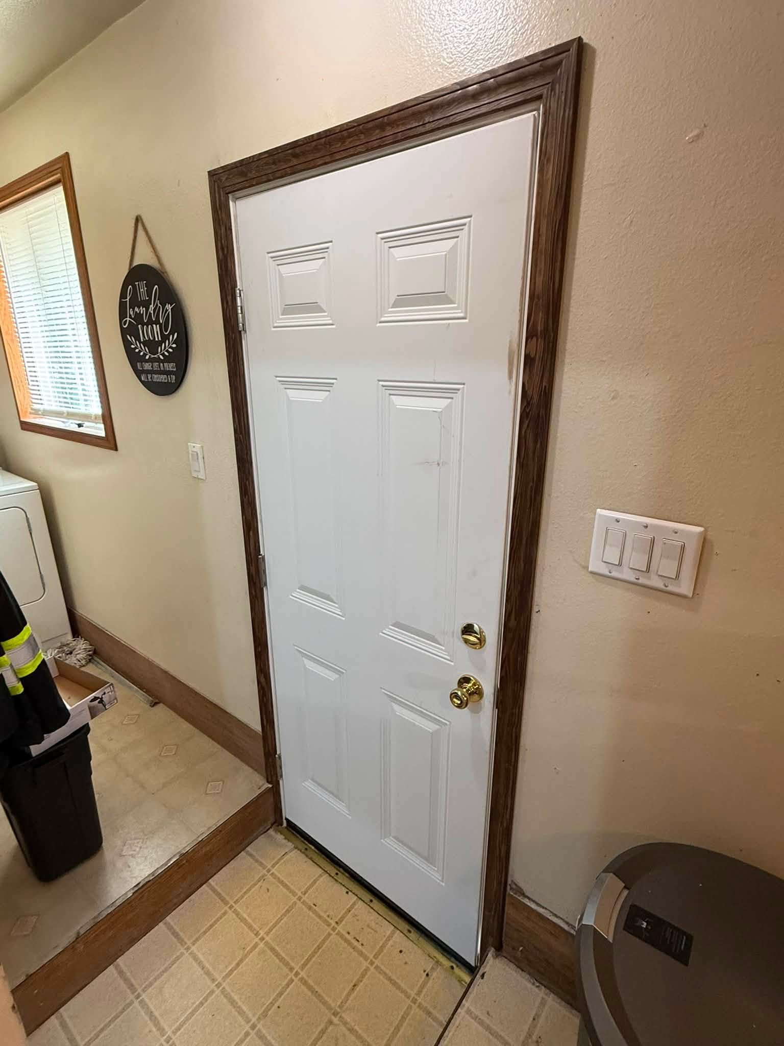 Repaired exterior door and frame